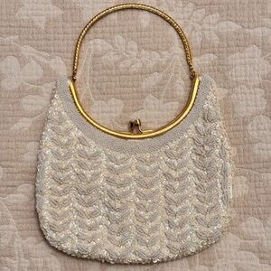 Elegant Cream Sequin Handbag with Gold Accents